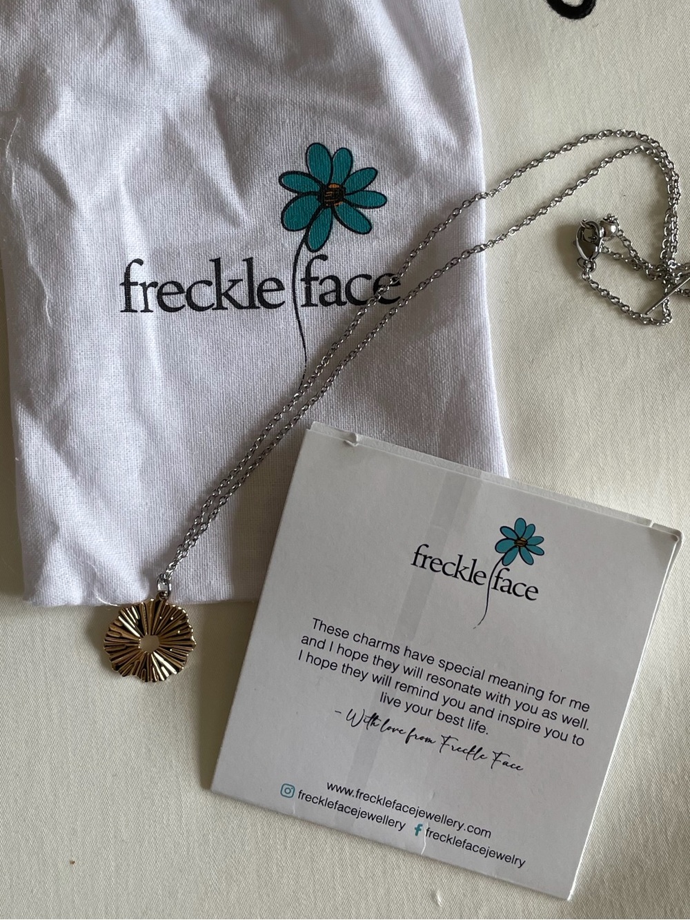 Gold Flower Pendant Necklace on Silver Chain